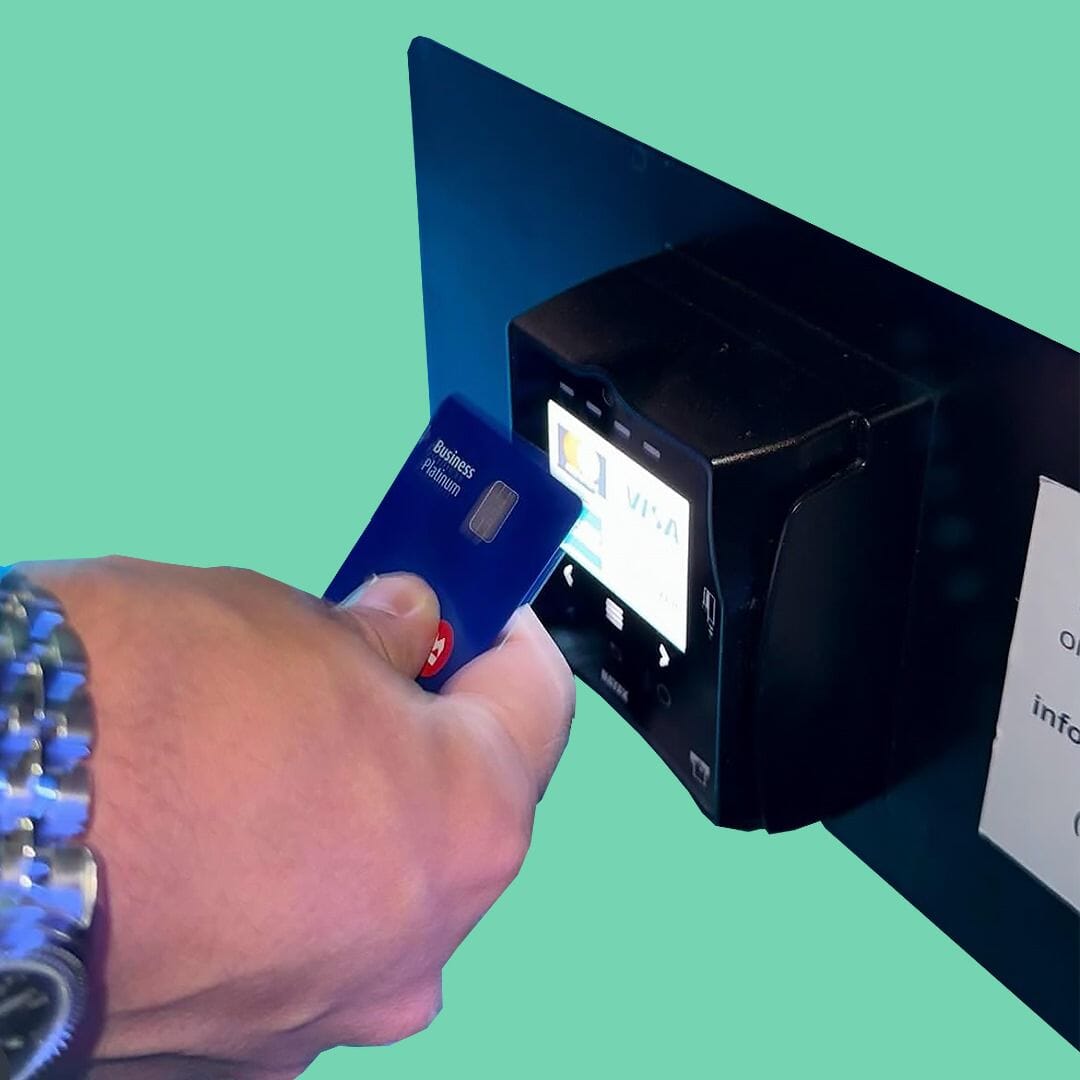 Contactless card interaction shown on a NAYAX VPOS Touch device