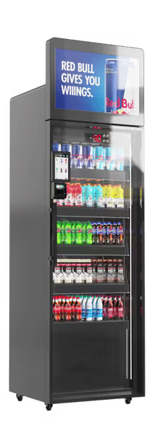 ReyVend AI smart cooler with glass door showing neatly stocked energy drinks and bottled beverages