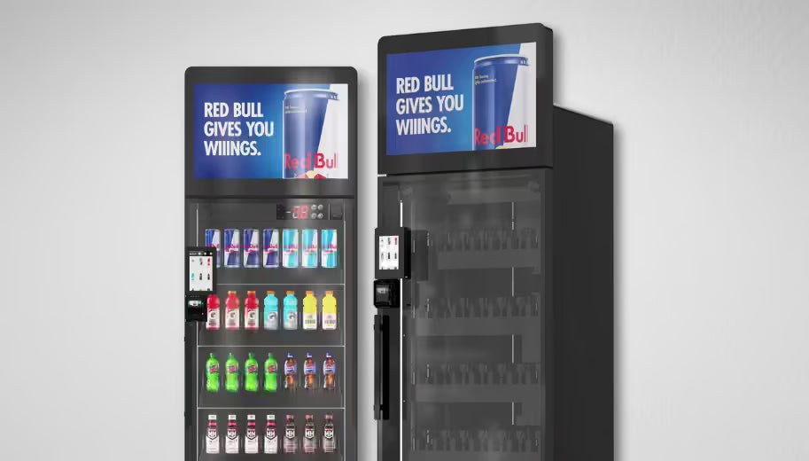 Two ReyVend AI smart coolers positioned side by side with branded beverage displays for retail environments