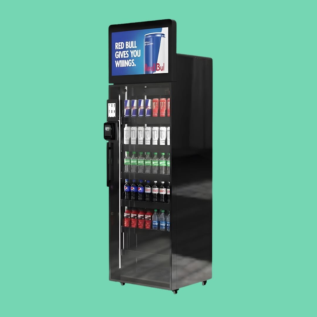 Angled view of the ReyVend Smart Cooler 1.0 fully stocked with drinks, featuring tap-to-pay activation and AI-powered grab-and-go product recognition.